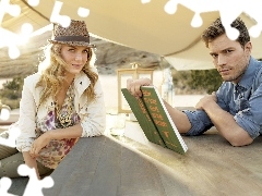 a man, Book, Hat, Necklace, Women