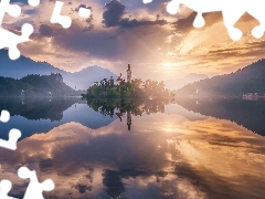 Blejski Otok Island, Church of the Annunciation of the Virgin Mary, reflection, Julian Alps Mountains, clouds, Lake Bled, Slovenia, Sunrise