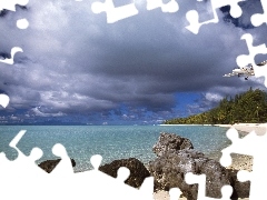 Coast, plane, clouds, rocks