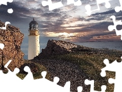 Lighthouse, rocks, clouds, maritime