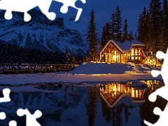 Mountains, lake, Province of British Columbia, Floodlit, Canada, viewes, winter, trees, house, Yoho National Park, Emerald Lake, Night, bridge