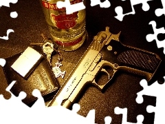 Gun, vodka, lighter, keys, wallet, Smirnoff