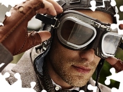 a man, goggles, pilot, model