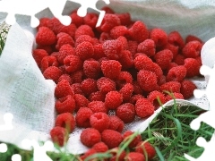 Raspberries, grass, napkin