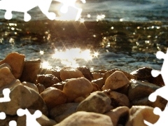 Stones, River, rays of the Sun