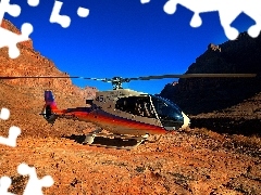 Helicopter, rocks
