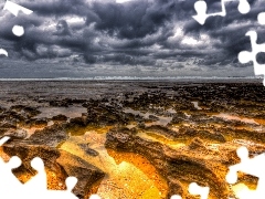 Stones, sea, clouds