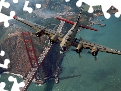 The Golden Gate Bridge, plane, turboprop