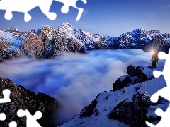 a man, Rocky, Snowy, peaks, Fog, Mountains