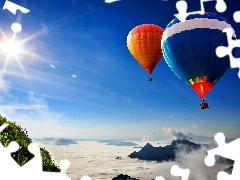 rays, Mountains, color, Balloons, sun, clouds